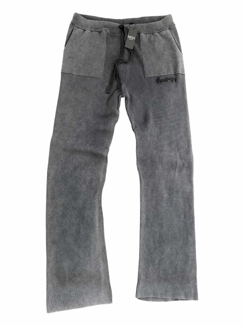 MAN OFFICIAL RIBBED KNIT PANTS